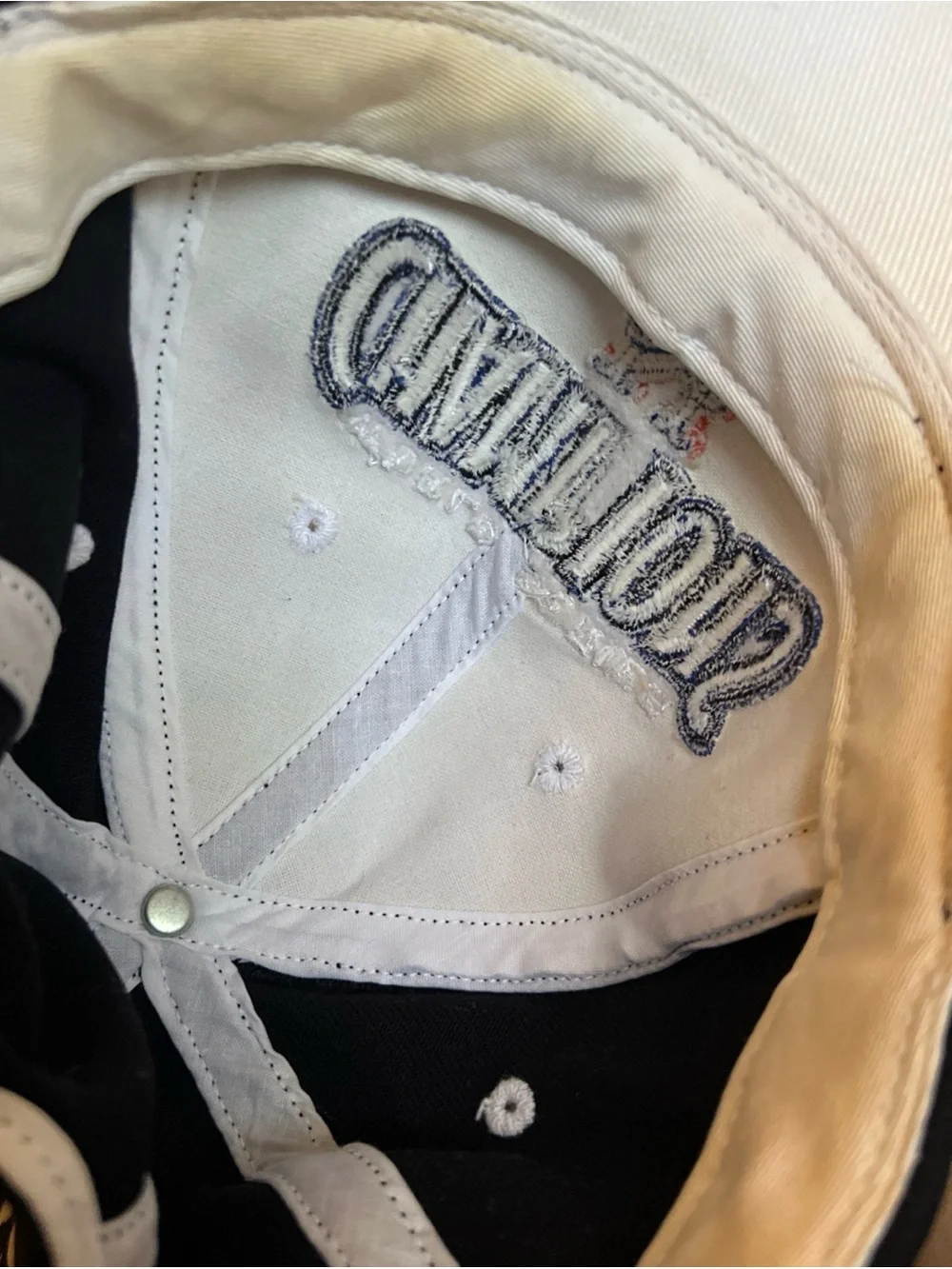 Genuine Merchandise black embroidered